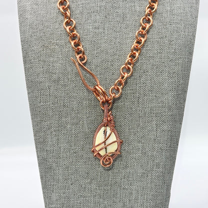 Abundant Beginings | Cowrie Shell Pendant on Handlinked chain